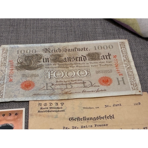 16 - Miscelaneous Grouping of WW2 German Paperwork

Group consists of notes , WHW paperwork and 2 post wa... 