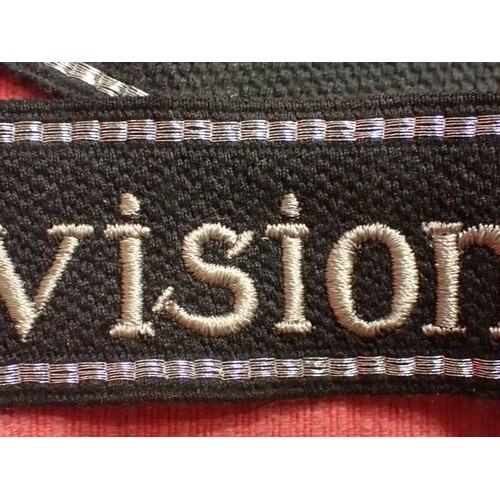 24 - WW2 German SS - Polizei - Division cuff title

Aluminium wirework edging. 455 mm long. Folded and st... 