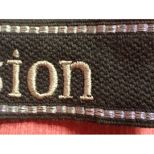 24 - WW2 German SS - Polizei - Division cuff title

Aluminium wirework edging. 455 mm long. Folded and st... 