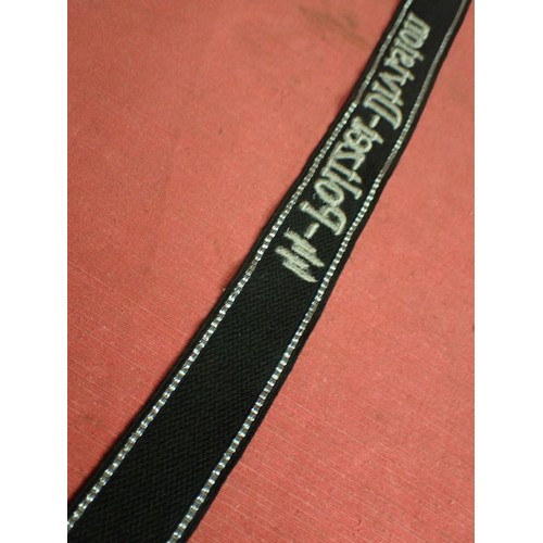 24 - WW2 German SS - Polizei - Division cuff title

Aluminium wirework edging. 455 mm long. Folded and st... 
