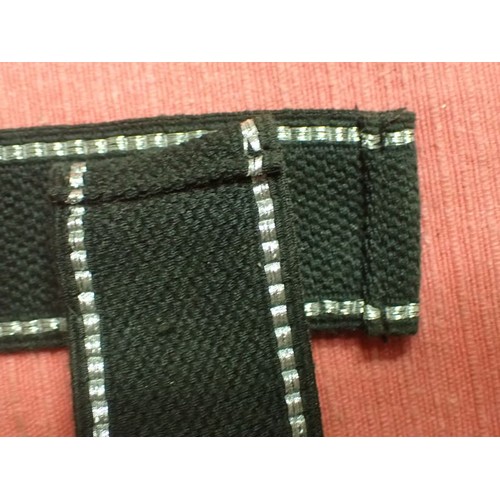 24 - WW2 German SS - Polizei - Division cuff title

Aluminium wirework edging. 455 mm long. Folded and st... 