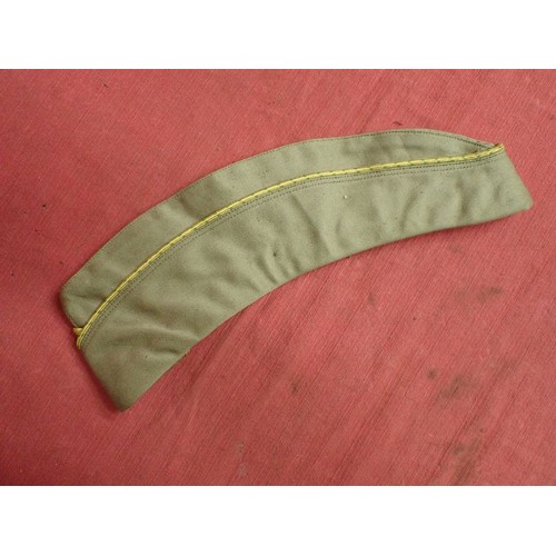 27 - U.S. WW2 women's garrison cap

Good clean condition with size, and maker labels inside.