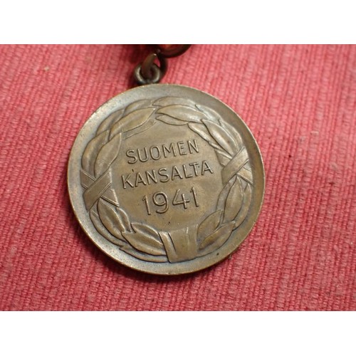 38 - WW2 Finnish / German east front medal

FINNISH MEDAL FOR THE WAR AGAINST RUSSIA. ALSO AWARDED TO THE... 