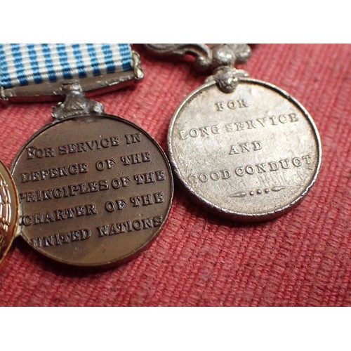 49 - Three British miniature medals

All three in good condition