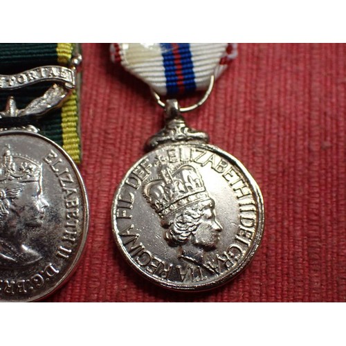 50 - British territorial medal minatures

Two territorial, and a ER2 1977 corronation medal