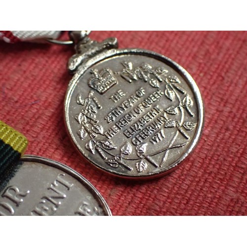 50 - British territorial medal minatures

Two territorial, and a ER2 1977 corronation medal