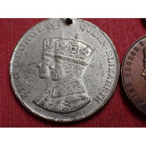 53 - Three George V and Mary medals

Largest 38 mm. One Nottingham related