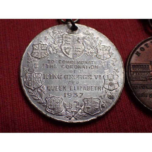 53 - Three George V and Mary medals

Largest 38 mm. One Nottingham related