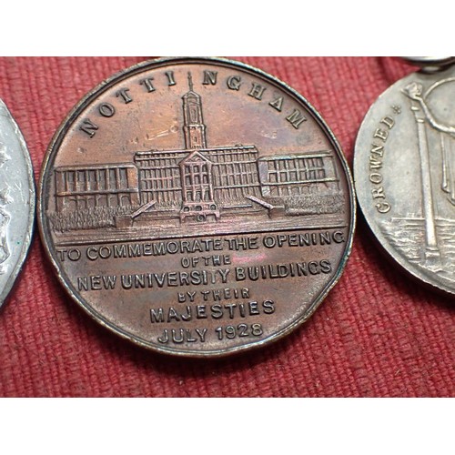 53 - Three George V and Mary medals

Largest 38 mm. One Nottingham related