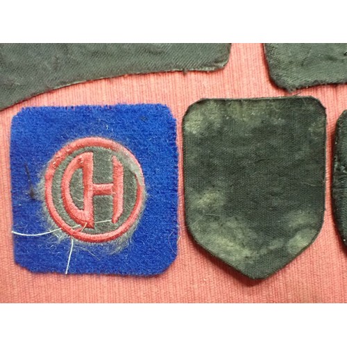 60 - Selection of WW2 British cloth B/D insignia

Pair of C.M.P., pair of ENSA, and three div patches inc... 