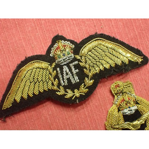 61 - WW2 Indian Air Force officer's cap badge

King's crown bullion wire I.A.F. officer's cap wings. 115 ... 