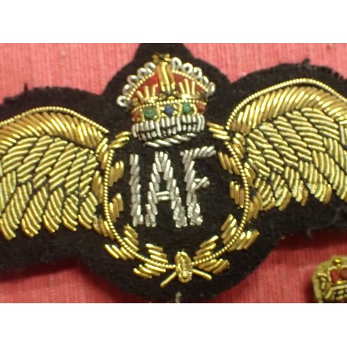 61 - WW2 Indian Air Force officer's cap badge

King's crown bullion wire I.A.F. officer's cap wings. 115 ... 