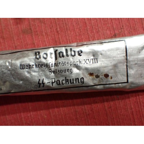 4 - Selection of WW2 German items

Four photographs, one dated on the back. Five army-marked clothing pe... 