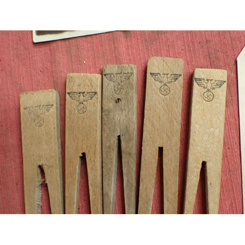 4 - Selection of WW2 German items

Four photographs, one dated on the back. Five army-marked clothing pe... 