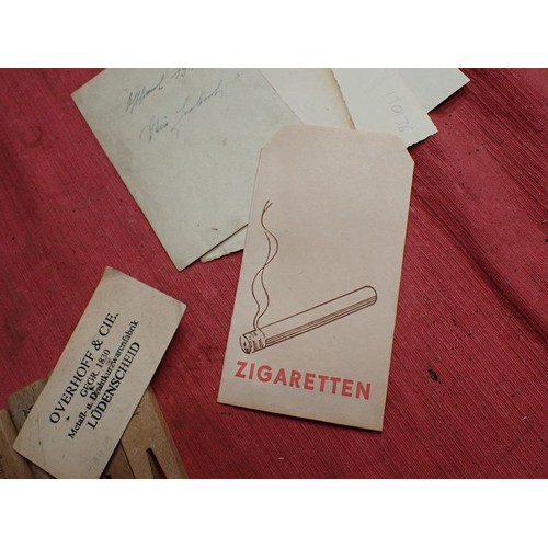 4 - Selection of WW2 German items

Four photographs, one dated on the back. Five army-marked clothing pe... 