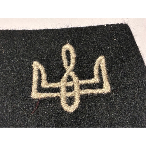 22 - WW2 German Waffen SS Ukranian Division Collar Tab

Late war example typical of the GI bringback hoar... 