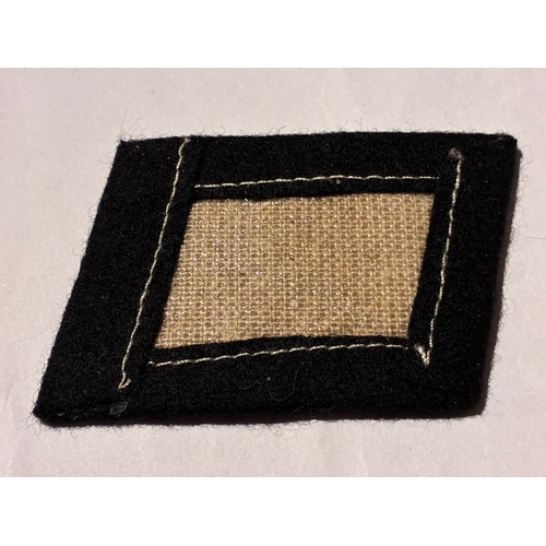 22 - WW2 German Waffen SS Ukranian Division Collar Tab

Late war example typical of the GI bringback hoar... 