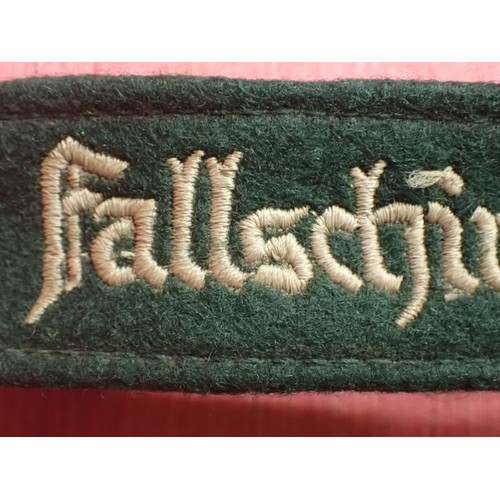 27 - Luftwaffe Fallschirmjager Division cuff title

EXCELLENT CONDITION FULL LENGTH CUFF TITLE - WOVEN ST... 