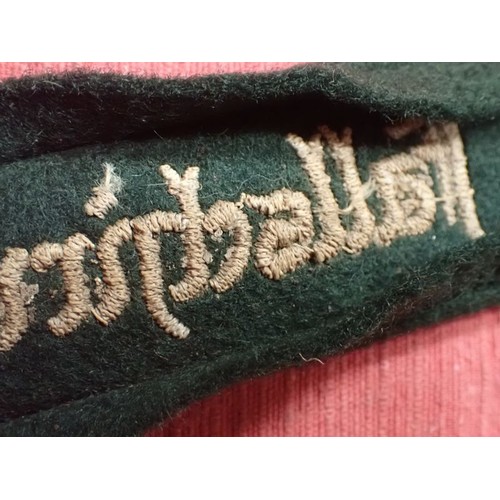 27 - Luftwaffe Fallschirmjager Division cuff title

EXCELLENT CONDITION FULL LENGTH CUFF TITLE - WOVEN ST... 