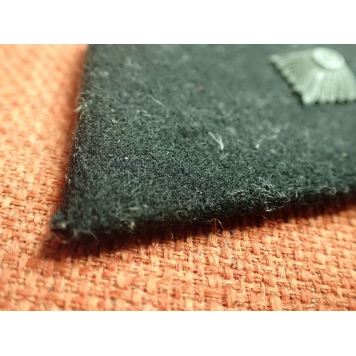 28 - WW2 German SS NCO RANK COLLAR TAB

BLACK TAB WITH ONE RANK PIP. THE PIP TURNED TO A GREY PATINA. NO ... 