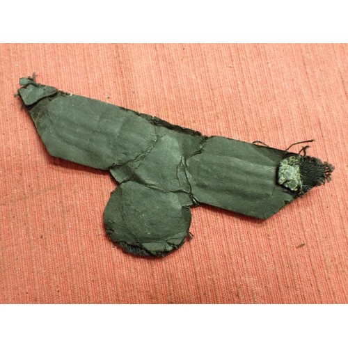 35 - WW2 German panzer crew breast eagle

Army eagle on black backing for panzer. With a crepe paper back... 