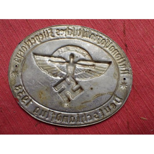 37 - 3rd Reich German 1938 N.S.F.K. plaque

Die-stamped aluminium plaque, 95 mm across. With black and bl... 