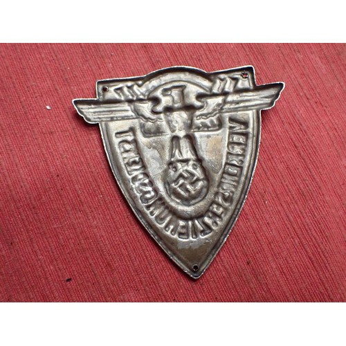43 - WW2 German N.S.F.K. small plaque

Die-stamped aluminium plaque. Black paint to the relief. 73 mm tal... 