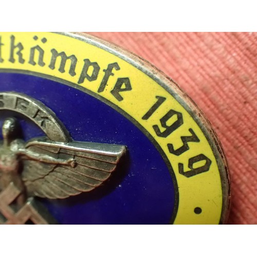 46 - WW2 German 1939 N.S.F.K. flyers badge

Convex badge. No enamel chips or loss. Three rivets for the f... 