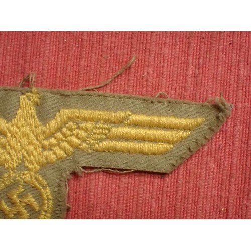 48 - WW2 German tropical coastal artillery breast eagle

With a grey felt backing. 102 mm across.