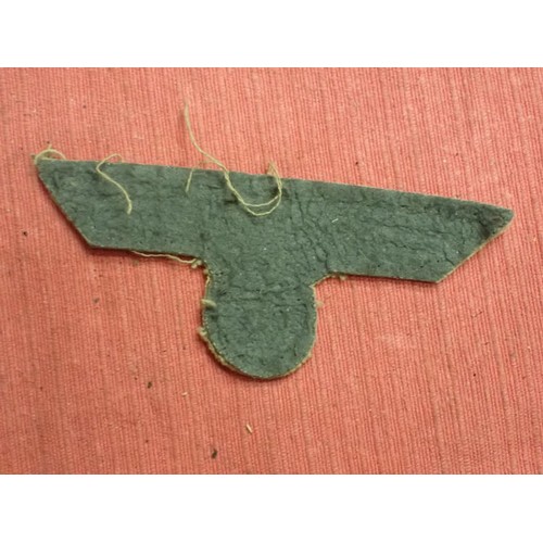 48 - WW2 German tropical coastal artillery breast eagle

With a grey felt backing. 102 mm across.