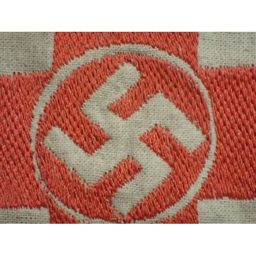 49 - WW2 German D.R.K. Red Cross armband

With a woven centre. The white is slightly discoloured; otherwi... 