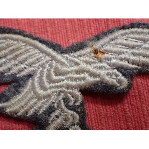 50 - WW2 German Luftwaffe breast eagle

Enlisted man's breast eagle. 95 mm across.