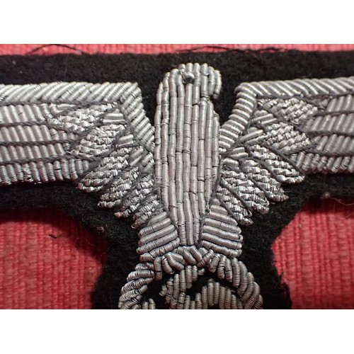 51 - WW2 German SS officers sleeve eagle

In good condition. All the aluminium wire is intact. No moth ni... 