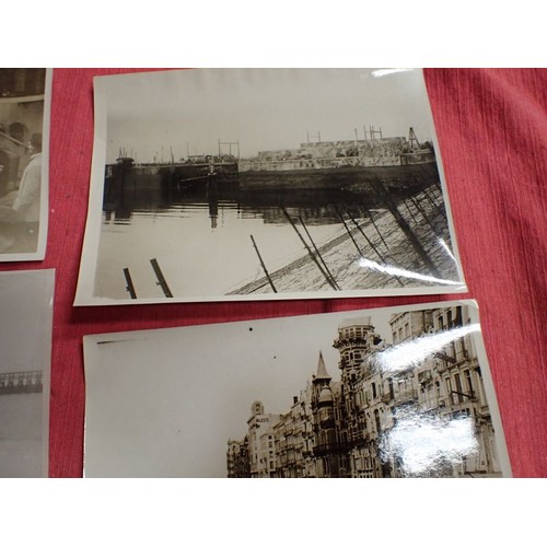 56 - Ten WW1 British official press release photographs

8 by 6 inch images. Coastal and ship-related.