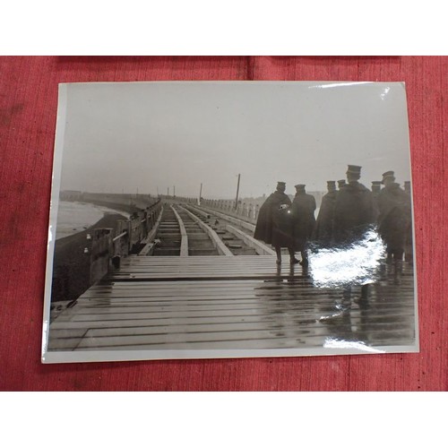 56 - Ten WW1 British official press release photographs

8 by 6 inch images. Coastal and ship-related.