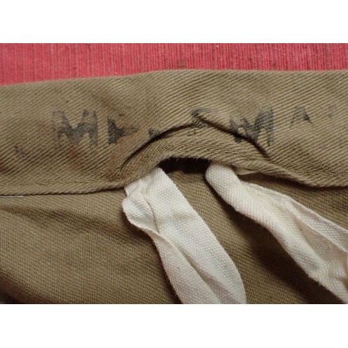 60 - WW1 British tropical pith-helmet cover dated 1914

Light tan canvas cover for the tropical helmet. M... 