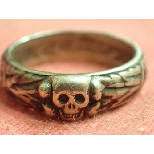 62 - WW2 German SS officers honour ring

Silver SS ring. The script on the inside appears to be , 