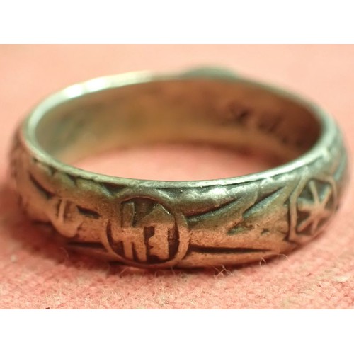 62 - WW2 German SS officers honour ring

Silver SS ring. The script on the inside appears to be , 