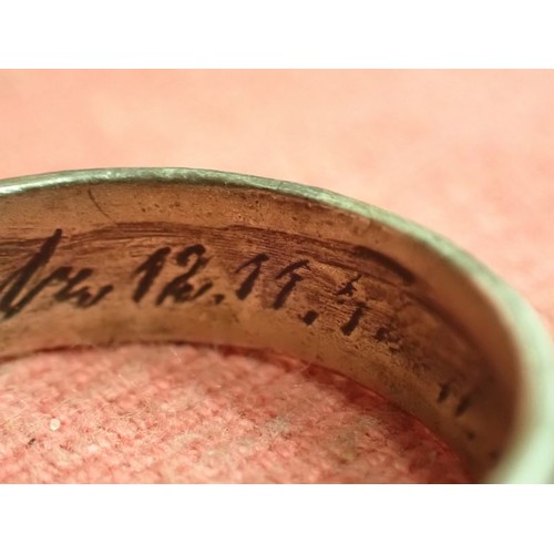 62 - WW2 German SS officers honour ring

Silver SS ring. The script on the inside appears to be , 