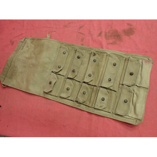 4 - WW2 British spare parts / tool roll

Maker marked dated 1942. Ten pop-stud closing compartments. 13 ... 