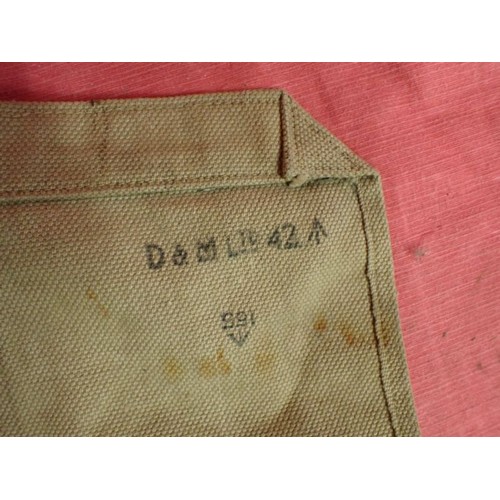 4 - WW2 British spare parts / tool roll

Maker marked dated 1942. Ten pop-stud closing compartments. 13 ... 