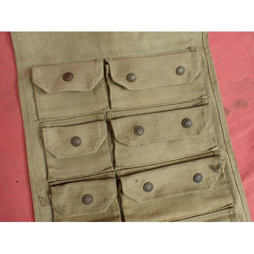 4 - WW2 British spare parts / tool roll

Maker marked dated 1942. Ten pop-stud closing compartments. 13 ... 