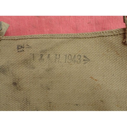 5 - WW2 British tool bag

Maker marked and dated 1943. 14 inches across.