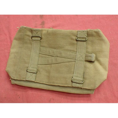5 - WW2 British tool bag

Maker marked and dated 1943. 14 inches across.