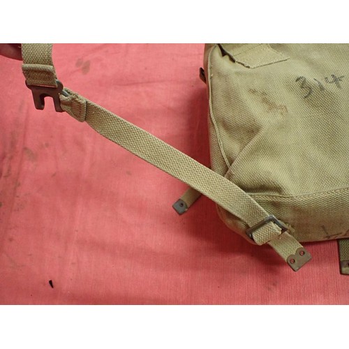 7 - WW2 British smallpack with shoulder straps

Pack dated 1942 with a matched pair of 1943-dated should... 