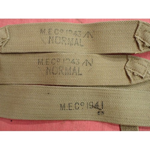 8 - Three WW2 British shoulder straps, one with fitted pouch

A matched pair dated 1943. A 1941 shoulder... 