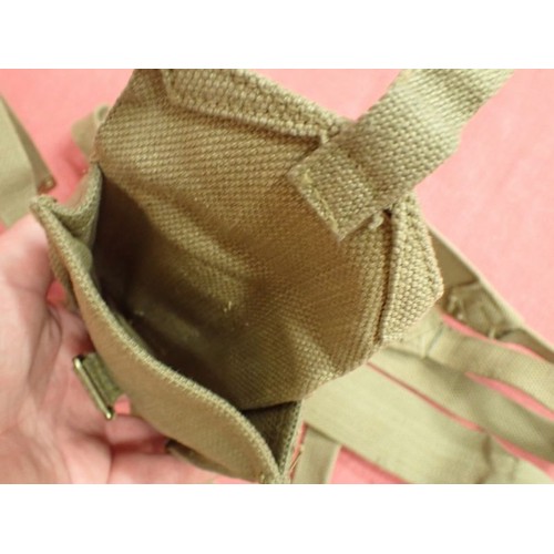 8 - Three WW2 British shoulder straps, one with fitted pouch

A matched pair dated 1943. A 1941 shoulder... 