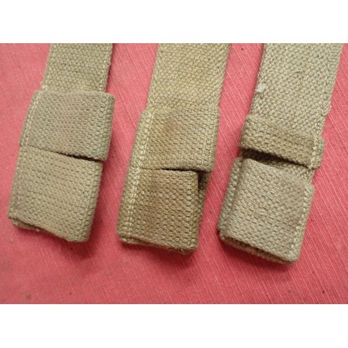 9 - Three WW2 British bayonet webbing frogs

All three in excellent clean condition with clear maker mar... 