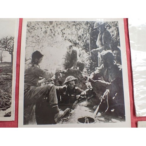 11 - Nine WW2 British press-release type photographs

Images of battle scenes and army life. Some with de... 