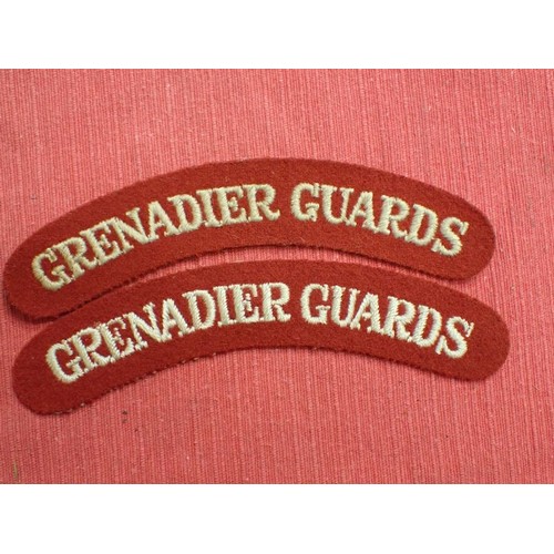 14 - WW2 British Grenadier Guards titles

Near-matching pair, 134 mm across.